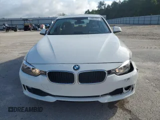 2014 BMW 3 Series 320i xDrive with VIN WBA3C3G52ENS67719, listed as a Copart auction lot 56863505 with 90,490 mi miles and Salvage title. Bid and sale history available at DreamBid. Image 5.