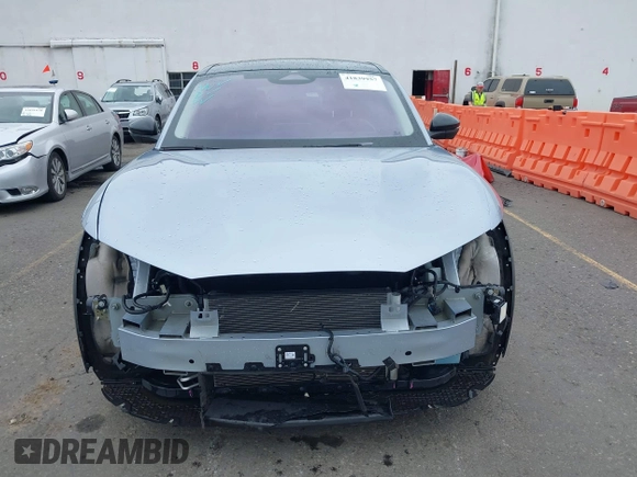 2022 Ford Mustang Mach-E Premium z VIN 3FMTK3SU4NMA04044, wystawiony jako IAAI lot #41839957 z przebiegiem 55 300 mil mil oraz . Historia ofert i sprzedaży dostępna na DreamBid. Obrazek 13.