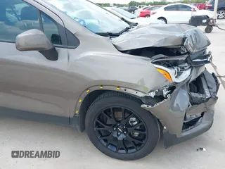 2021 Chevrolet Trax LT with VIN KL7CJLSBXMB359468, listed as a IAAI auction lot 41982149 with 199,685 mi miles and . Bid and sale history available at DreamBid. Image 17.