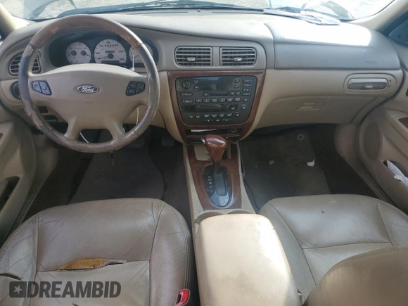 2003 Ford Taurus SEL Deluxe with VIN 1FAHP56SX3A243775, listed as a Copart auction lot 72245394 with 251,041 mi miles and Salvage Title. Bid and sale history available at DreamBid. Image 8.