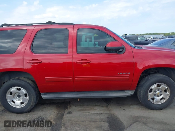 2013 Chevrolet Tahoe LS with VIN 1GNSCAE00DR359498, listed as a IAAI auction lot 40125477 with 156,100 mi miles and . Bid and sale history available at DreamBid. Image 12.