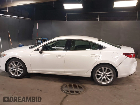 2014 Mazda Mazda6 i Touring with VIN JM1GJ1V68E1147067, listed as a IAAI auction lot 42105878 with 102,684 mi miles. Bid and sale history available at carsss.com. Image 14.
