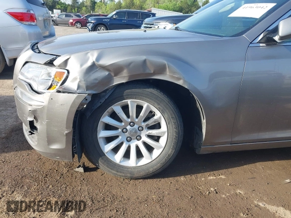 2014 Chrysler 300 with VIN 2C3CCAAG4EH159911, listed as a IAAI auction lot 41963042 with 105,972 mi miles and . Bid and sale history available at DreamBid. Image 6.