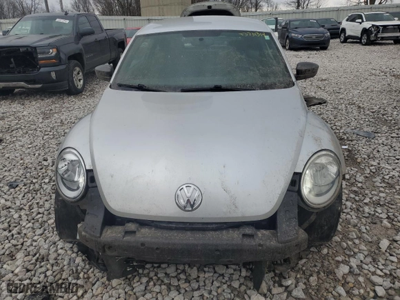 2013 Volkswagen Beetle Coupe 2.5L Entry with VIN 3VWFX7AT7DM604054, listed as a Copart auction lot 83731314 with 154,202 mi miles and Clean Title. Bid and sale history available at carsss.com. Image 5.