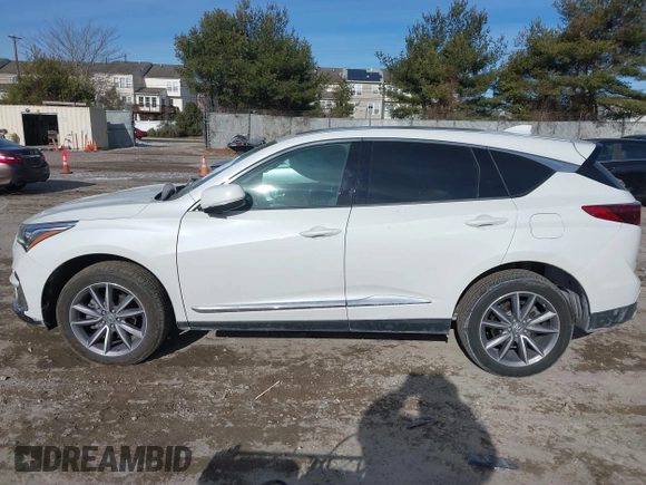 2020 Acura RDX Technology with VIN 5J8TC2H52LL033263, listed as a IAAI auction lot 41293471 with 62,393 mi miles and . Bid and sale history available at DreamBid. Image 14.