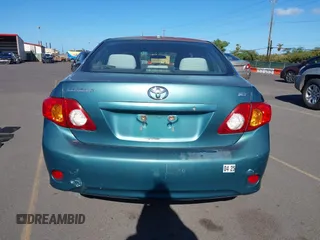 2009 Toyota Corolla with VIN 1NXBU40E39Z119288, listed as a IAAI auction lot 40477607 with 76,584 mi miles. Bid and sale history available at carsss.com. Image 15.