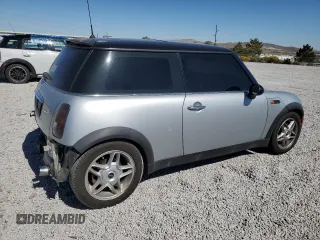 2002 MINI Hardtop with VIN WMWRC33472TC34281, listed as a Copart auction lot 71631644 with 196,947 mi miles and Salvage Title. Bid and sale history available at DreamBid. Image 3.