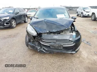 2019 Ford Fiesta SE z VIN 3FADP4BJ7KM158142, wystawiony jako IAAI lot #41510806 z przebiegiem 55 315 mil mil oraz . Historia ofert i sprzedaży dostępna na DreamBid. Obrazek 6.