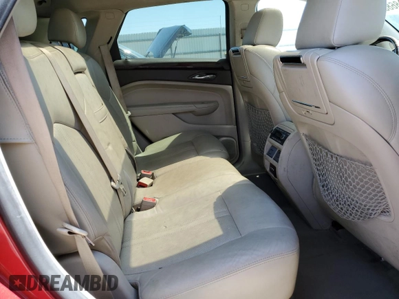 2011 Cadillac SRX Premium Collection z VIN 3GYFNCEY5BS586695, wystawiony jako Copart lot #52186835 z przebiegiem 142 210 mil mil oraz Czysty tytuł • Clean title. Historia ofert i sprzedaży dostępna na DreamBid. Obrazek 11.