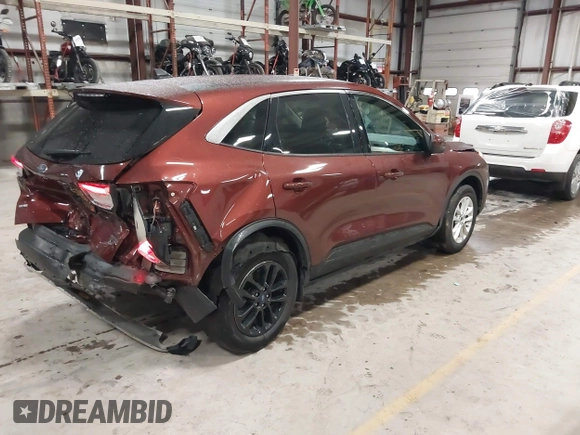 2021 Ford Escape SE with VIN 1FMCU9G69MUA91893, listed as a IAAI auction lot 42313453 with 71,278 mi miles and . Bid and sale history available at DreamBid. Image 4.