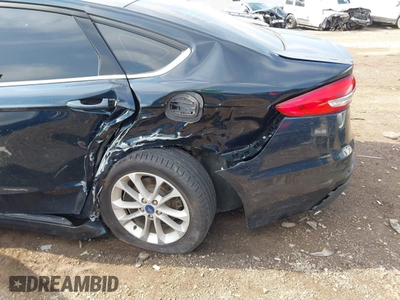 2020 Ford Fusion SE z VIN 3FA6P0HDXLR224898, wystawiony jako IAAI lot #42269794 z przebiegiem 55 023 mil mil oraz . Historia ofert i sprzedaży dostępna na DreamBid. Obrazek 6.