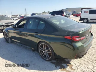 2023 BMW M5 with VIN WBS83CH04PCL77304, listed as a Copart auction lot 76096754 with 0 mi miles and Non Repairable. Bid and sale history available at carsss.com. Image 2.