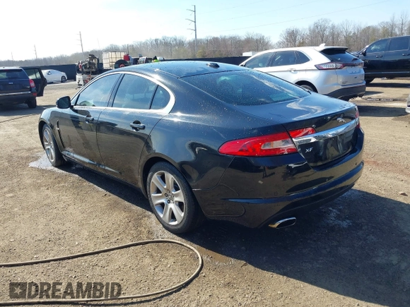 2011 Jaguar XF with VIN SAJWA0FB7BLS01476, listed as a IAAI auction lot 41662462 with 128,048 mi miles. Bid and sale history available at carsss.com. Image 3.