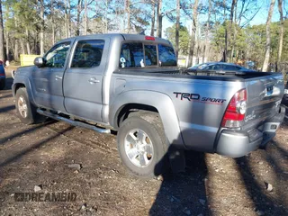 2015 Toyota Tacoma PreRunner z VIN 3TMJU4GNXFM191580, wystawiony jako IAAI lot #41216357 z przebiegiem 78 490 mil mil oraz . Historia ofert i sprzedaży dostępna na DreamBid. Obrazek 3.
