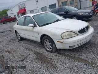2003 Mercury Sable LS Premium with VIN 1MEFM55S93A622521, listed as a IAAI auction lot 41970248 with 216,534 mi miles. Bid and sale history available at carsss.com. Image 1.