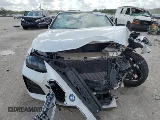 2025 BMW 4 Series 430i with VIN WBA33DB06SCS07578, listed as a Copart auction lot 43114995 with 5,169 mi miles and Salvage title. Bid and sale history available at DreamBid. Image 5.
