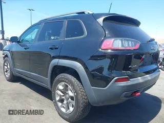 2019 Jeep Cherokee Trailhawk with VIN 1C4PJMBXXKD433284, listed as a IAAI auction lot 42020051 with 57,089 mi miles and . Bid and sale history available at DreamBid. Image 3.