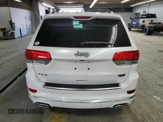 2018 Jeep Grand Cherokee Summit with VIN 1C4RJFJT5JC273869, listed as a Copart auction lot 57482865 with 70,843 mi miles and Salvage title. Bid and sale history available at DreamBid. Image 6.