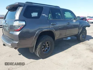 2021 Toyota 4Runner TRD Off Road Premium with VIN JTERU5JR3M5879360, listed as a IAAI auction lot 42338868 with 54,742 mi miles and . Bid and sale history available at DreamBid. Image 4.