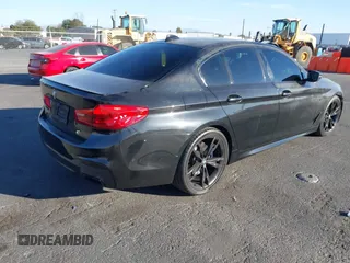 2019 BMW 5 Series M550i xDrive with VIN WBAJB9C51KB288416, listed as a IAAI auction lot 41265378 with 52,529 mi miles and . Bid and sale history available at DreamBid. Image 4.