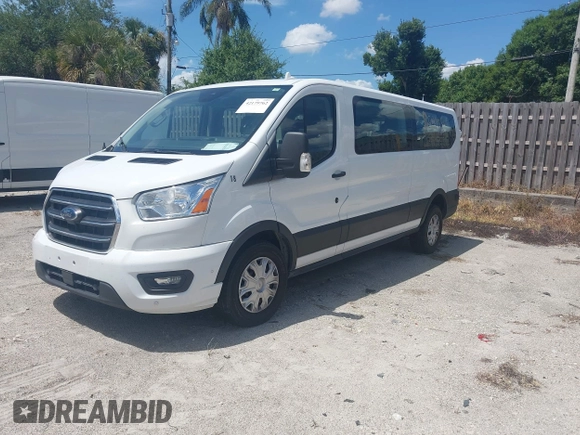 2020 Ford Transit Passenger XL z VIN 1FBAX2Y86LKA22944, wystawiony jako IAAI lot #42179762 z przebiegiem 102 295 mil mil oraz . Historia ofert i sprzedaży dostępna na DreamBid. Obrazek 17.