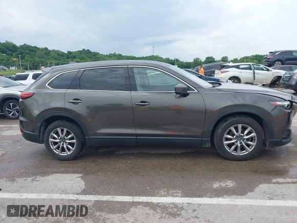2017 Mazda CX-9 Touring z VIN JM3TCACY7H0129335, wystawiony jako IAAI lot #42289926 z przebiegiem 60 425 mil mil oraz . Historia ofert i sprzedaży dostępna na DreamBid. Obrazek 14.