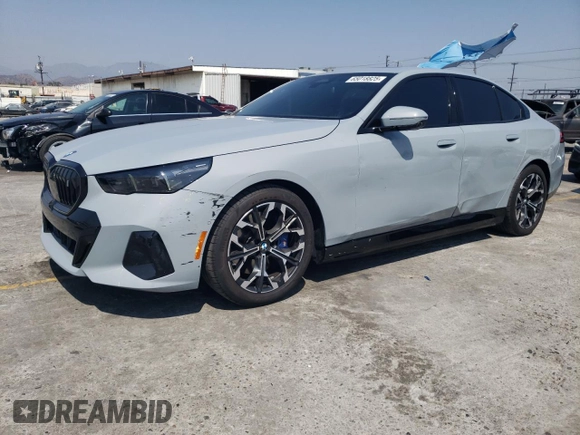 2024 BMW i5 eDrive40 with VIN WBY33FK09RCR17369, listed as a Copart auction lot 65018825 with 3,853 mi miles and Clean title. Bid and sale history available at DreamBid. Image 1.