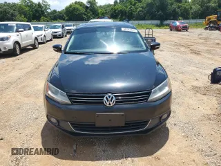 2012 Volkswagen Jetta TDI w/Premium & Nav with VIN 3VWLL7AJ7CM367139, listed as a Copart auction lot 60587835 with 238,919 mi miles and Clean title. Bid and sale history available at DreamBid. Image 5.
