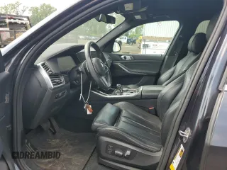 2019 BMW X5 xDrive40i with VIN 5UXCR6C57KLL11051, listed as a Copart auction lot 60268695 with 169,671 mi miles and Salvage title. Bid and sale history available at DreamBid. Image 7.
