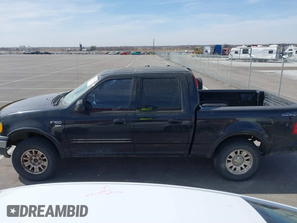 2003 Ford F-150 XLT with VIN 1FTRW08L83KA14760, listed as a IAAI auction lot 41820943 with 215,130 mi miles. Bid and sale history available at carsss.com. Image 14.