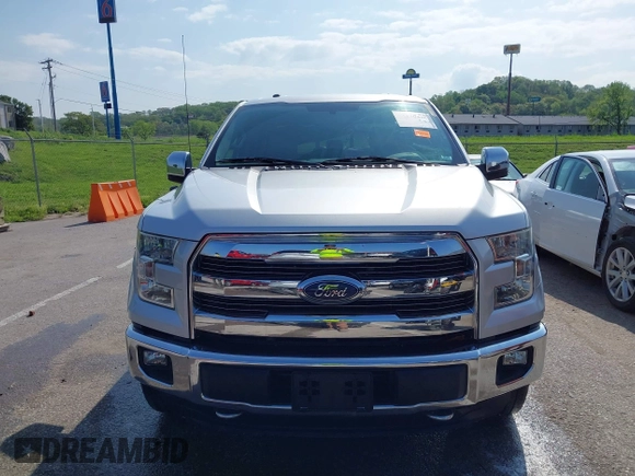 2015 Ford F-150 XLT with VIN 1FTEW1EG8FKE61864, listed as a IAAI auction lot 42120436 with 129,448 mi miles and . Bid and sale history available at DreamBid. Image 13.