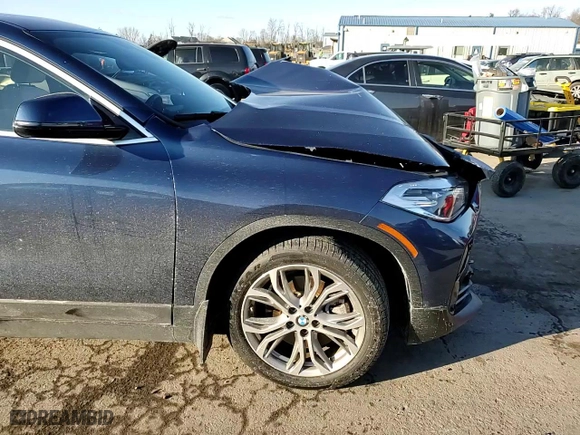 2022 BMW X2 xDrive28i with VIN WBXYJ1C04N5T58796, listed as a Copart auction lot 88723255 with 0 mi miles and Salvage Title. Bid and sale history available at carsss.com. Image 11.