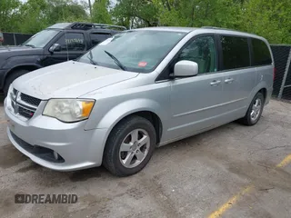 2011 Dodge Grand Caravan Crew with VIN 2D4RN5DG7BR786789, listed as a IAAI auction lot 42141124 with 167,353 mi miles and . Bid and sale history available at DreamBid. Image 2.