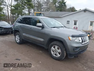 2012 Jeep Grand Cherokee Laredo with VIN 1C4RJFAG0CC270545, listed as a IAAI auction lot 41940781 with 200,529 mi miles. Bid and sale history available at carsss.com. Image 1.