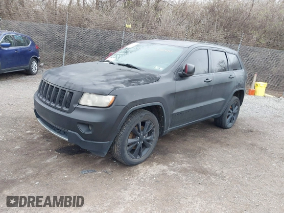 2013 Jeep Grand Cherokee Laredo with VIN 1C4RJEAG2DC573970, listed as a IAAI auction lot 41892914 with 185,050 mi miles. Bid and sale history available at carsss.com. Image 2.