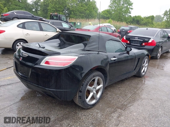 2009 Saturn Sky z VIN 1G8MN35B59Y104152, wystawiony jako IAAI lot #42308236 z przebiegiem 190 823 mil mil oraz . Historia ofert i sprzedaży dostępna na DreamBid. Obrazek 4.