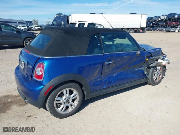 2013 MINI Cooper Convertible with VIN WMWZN3C56DT135566, listed as a IAAI auction lot 41414064 with 58,593 mi miles. Bid and sale history available at carsss.com. Image 4.