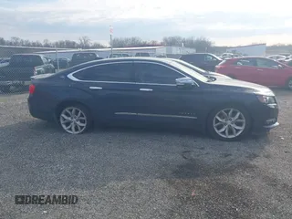 2015 Chevrolet Impala LT z VIN 2G1125S37F9251723, wystawiony jako IAAI lot #41869286 z przebiegiem 157 707 mil mil oraz . Historia ofert i sprzedaży dostępna na DreamBid. Obrazek 13.