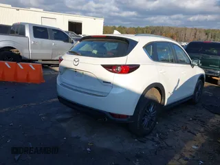 2020 Mazda CX-5 Sport with VIN JM3KFABMXL1824574, listed as a IAAI auction lot 41029057 with 47,760 mi miles. Bid and sale history available at carsss.com. Image 4.
