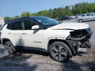2018 Jeep Compass Latitude z VIN 3C4NJDBB2JT281182, wystawiony jako IAAI lot #42392069 z przebiegiem 112 758 mil mil oraz . Historia ofert i sprzedaży dostępna na DreamBid. Obrazek 13.