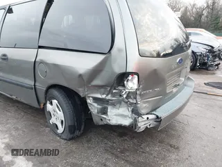 2005 Ford Freestar SE z VIN 2FMZA51625BA54311, wystawiony jako IAAI lot #41120117 z przebiegiem 139 647 mil mil oraz . Historia ofert i sprzedaży dostępna na DreamBid. Obrazek 6.