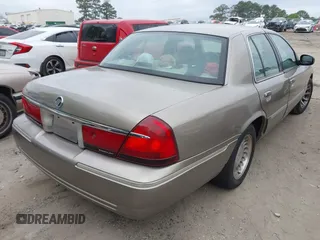 2001 Mercury Grand Marquis LS with VIN 2MEFM75W71X643239, listed as a IAAI auction lot 42048113 with 195,441 mi miles and . Bid and sale history available at DreamBid. Image 4.