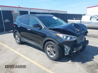 2017 Hyundai Santa Fe 2.4L z VIN 5NMZU3LB4HH024307, wystawiony jako IAAI lot #42147423 z przebiegiem 72 504 mil mil oraz . Historia ofert i sprzedaży dostępna na DreamBid. Obrazek 1.