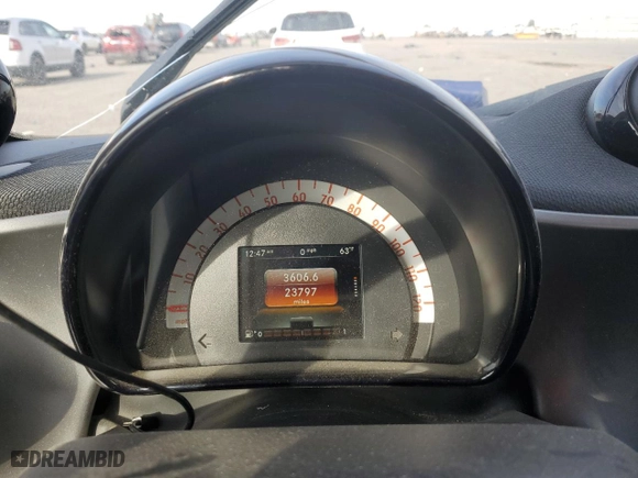 2016 Smart fortwo Passion with VIN WMEFJ5DA1GK064460, listed as a Copart auction lot 71034744 with 23,797 mi miles and Salvage Title. Bid and sale history available at carsss.com. Image 9.