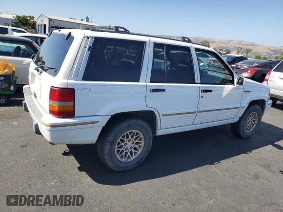 1995 Jeep Grand Cherokee Limited z VIN 1J4GZ78S0SC575083, wystawiony jako Copart lot #61047975 z przebiegiem 205 407 mil mil oraz Czysty tytuł • Clean title. Historia ofert i sprzedaży dostępna na DreamBid. Obrazek 3.