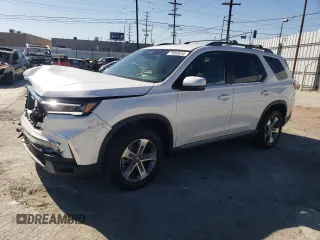 2024 Honda Pilot EX-L 8 Passenger with VIN 5FNYG1H46RB026726, listed as a Copart auction lot 79063614 with 4,169 mi miles and Salvage Title. Bid and sale history available at carsss.com. Image 1.