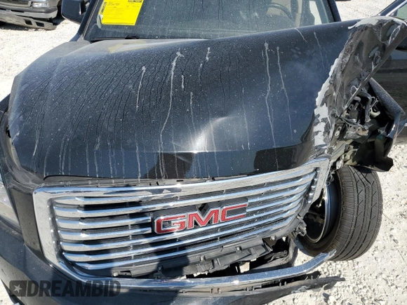 2017 GMC Yukon SLT with VIN 1GKS2BKC7HR299990, listed as a Copart auction lot 75809404 with Not Provided miles and Salvage Title. Bid and sale history available at DreamBid. Image 12.