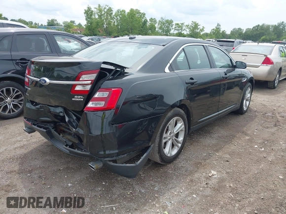 2015 Ford Taurus SEL with VIN 1FAHP2E80FG192017, listed as a IAAI auction lot 42562853 with 124,348 mi miles and . Bid and sale history available at DreamBid. Image 4.