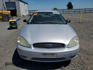 2005 Ford Taurus SE with VIN 1FAFP53U25A303516, listed as a Copart auction lot 63250505 with 203,463 mi miles and Salvage title. Bid and sale history available at DreamBid. Image 5.