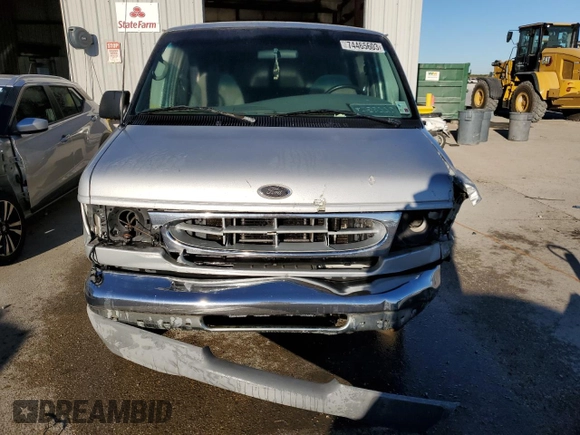 2002 Ford Econoline Passenger XL with VIN 1FMRE11LX2HB04681, listed as a Copart auction lot 60885454 with 114,665 mi miles and Salvage title. Bid and sale history available at DreamBid. Image 5.